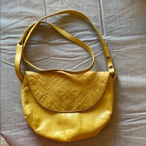 Hobo yellow tooled leather flap handbag